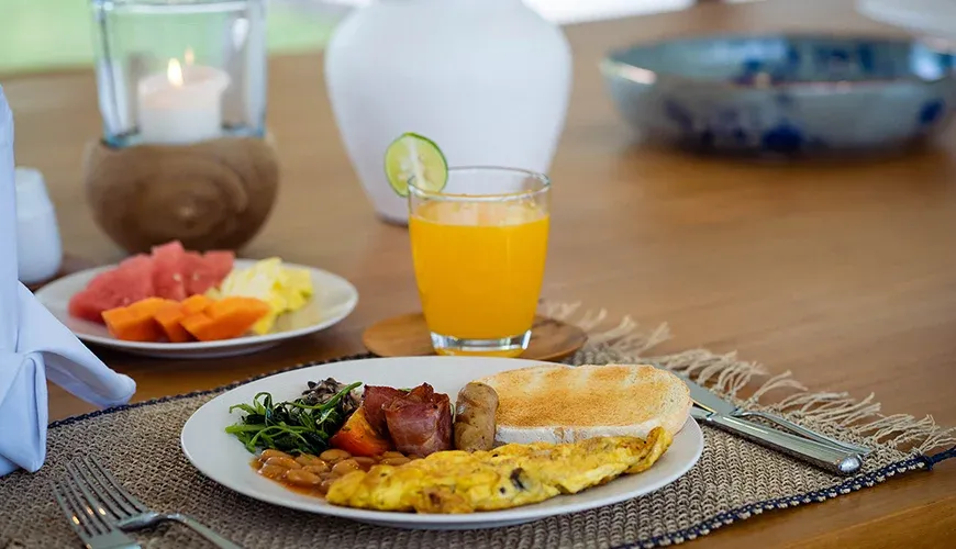Arita Villa Canggu, Canggu, Bali — beautifully presented breakfast with fresh fruit and savory items | The Luxury Bali