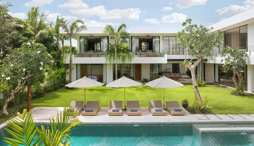 Arita Villa Canggu, Canggu, Bali — bright and airy pool area surrounded by lush greenery, photo 12 | The Luxury Bali
