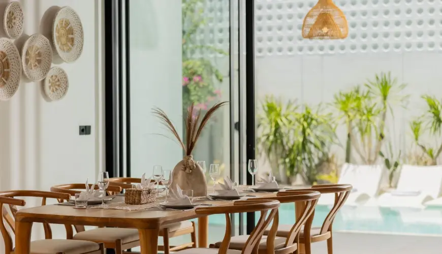 Fenta Villa, Canggu, Bali — bright bali dining area overlooking a private pool | The Luxury Bali