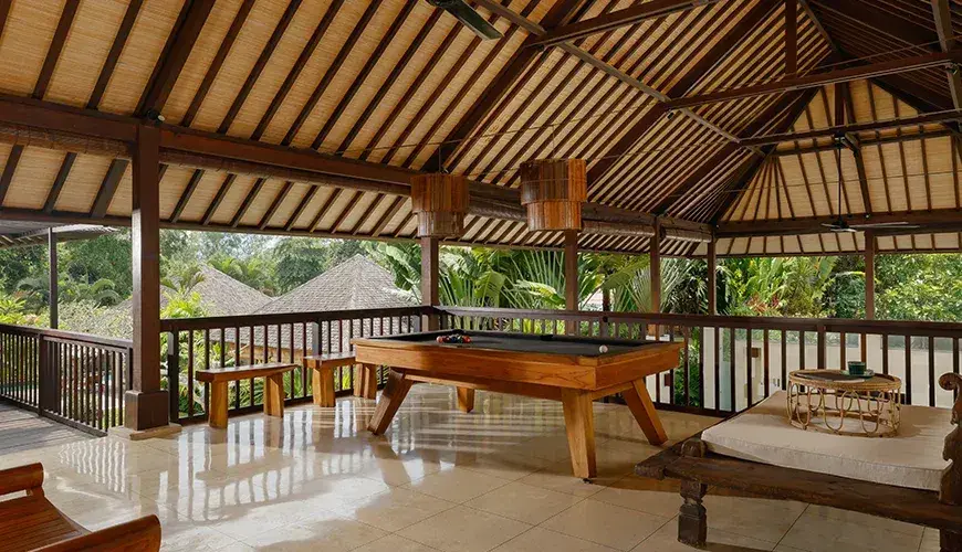 Villa Nelayan, Seminyak, Bali — relaxed billiards area with abundant natural light canggu | The Luxury Bali