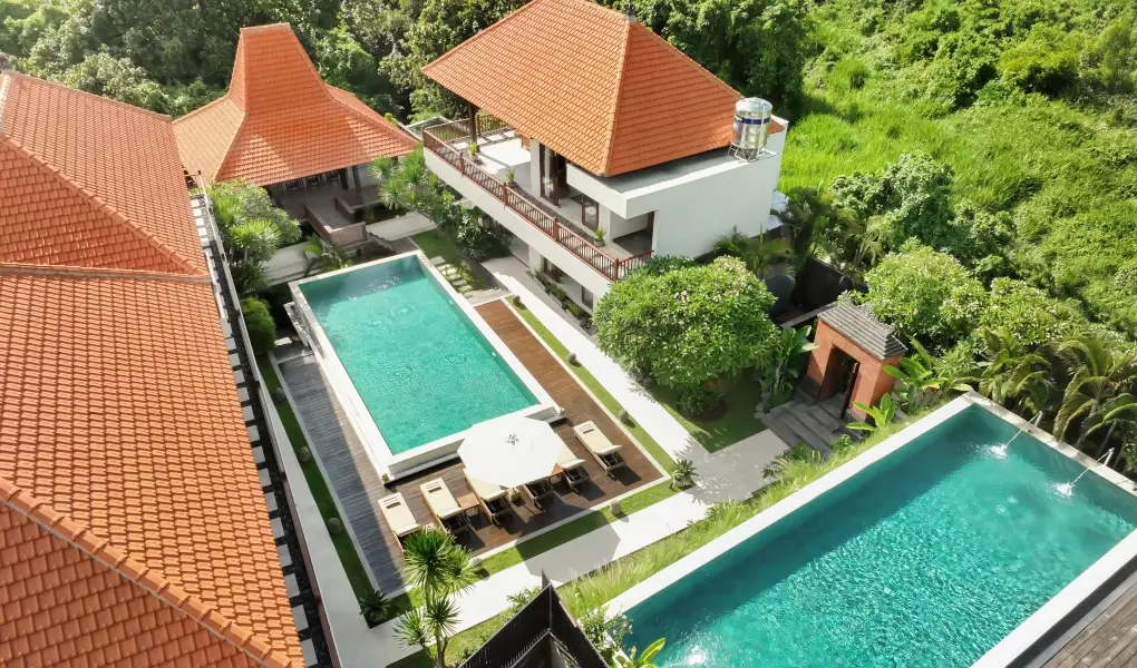 The Bija Villas, Canggu, Bali — aerial view of a villa with two swimming pools | The Luxury Bali