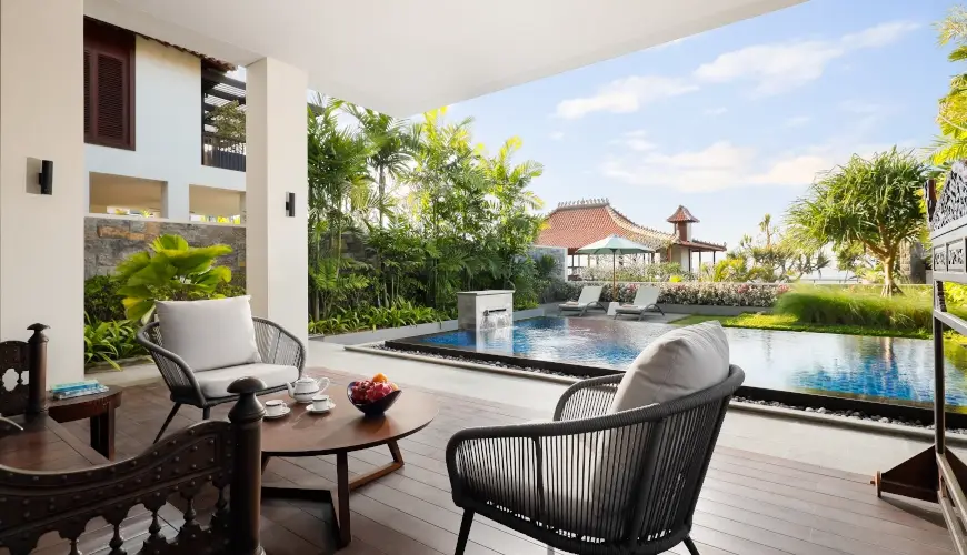 The Tulou Bali, Jimbaran, Bali — luxury villa outdoor seating area with private pool | The Luxury Bali