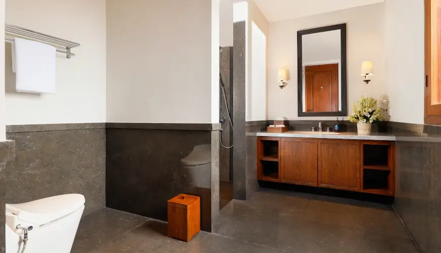 The Tulou Bali, Jimbaran, Bali — modern bathroom with a vanity and a walk in shower | The Luxury Bali