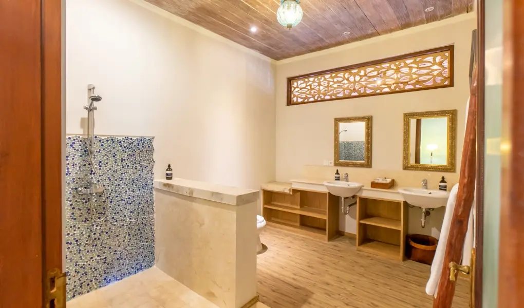 Villa Angsa, Sanur, Bali — bathroom with dual sinks and a blue mosaic tiled shower | The Luxury Bali
