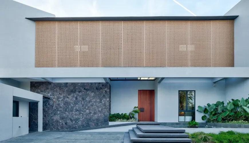 Villa Brandon, Jimbaran, Bali — modern villa entrance with a unique stone facade | The Luxury Bali