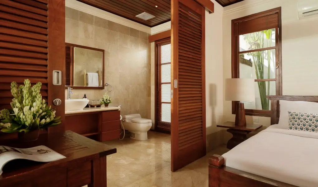 Villa Edward, Jimbaran, Bali — bathroom and bedroom suite with natural light | The Luxury Bali