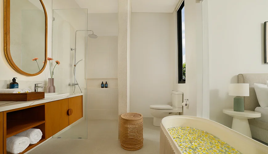 Villa Kalem Canggu, Canggu, Bali — beautiful master bath with a spacious vanity and soaking tub | The Luxury Bali