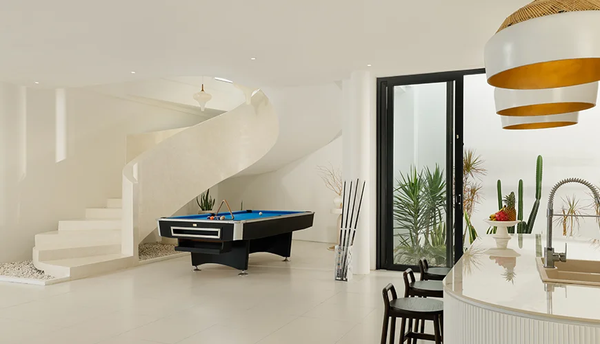 Villa Kalem Canggu, Canggu, Bali — modern billiards room with a spiral staircase | The Luxury Bali
