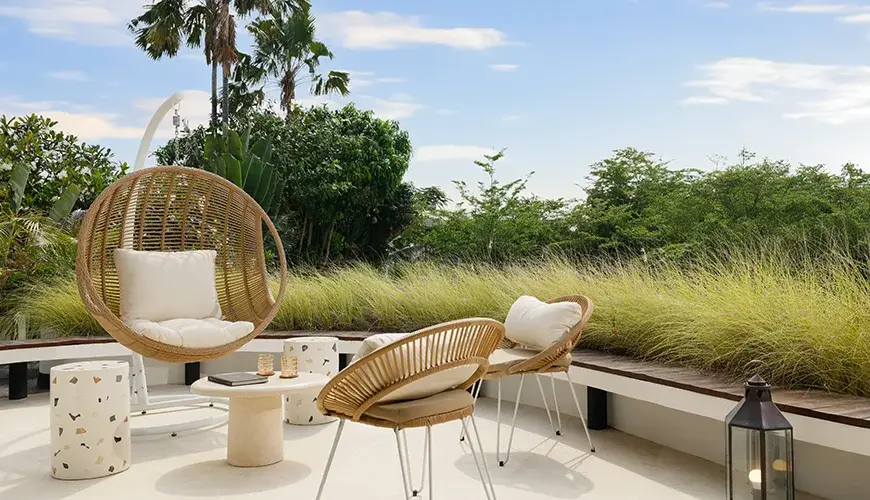 Villa Kalem Canggu, Canggu, Bali — relaxing outdoor terrace with comfortable seating and greenery | The Luxury Bali