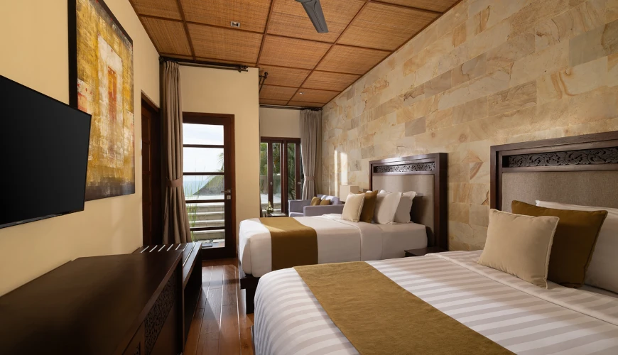 Villa Nagasutra, Uluwatu, Bali — comfortable twin bedroom ocean view balcony | The Luxury Bali