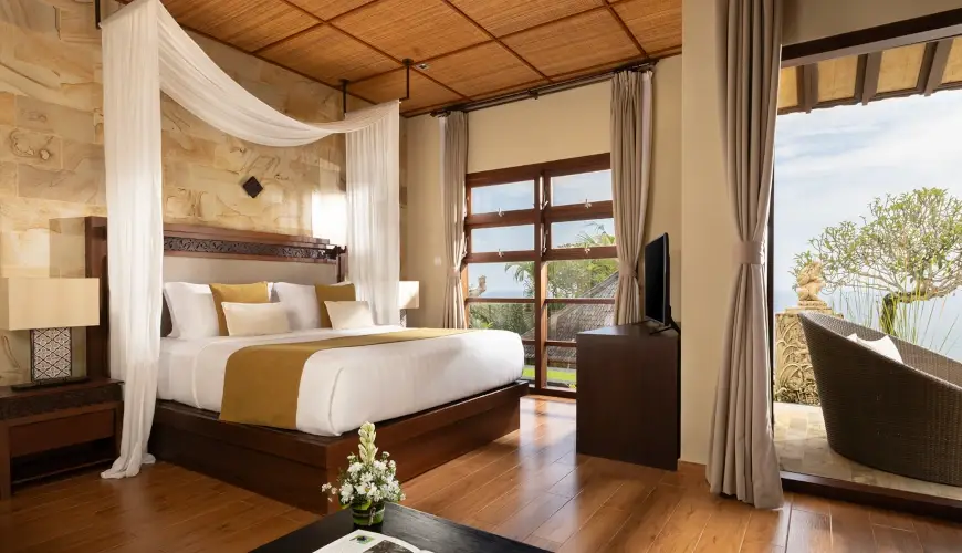 Villa Nagasutra, Uluwatu, Bali — luxury bedroom private balcony ocean views | The Luxury Bali