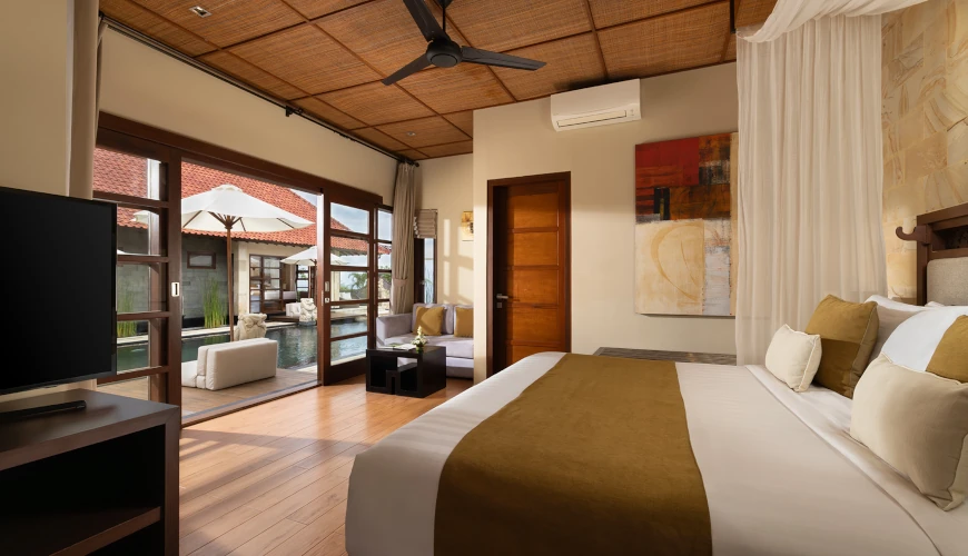 Villa Nagasutra, Uluwatu, Bali — luxury bedroom private pool access tranquil oasis | The Luxury Bali