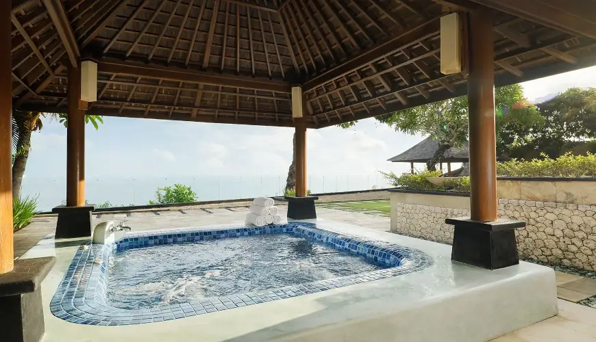 Villa Nagasutra, Uluwatu, Bali — ocean view jacuzzi relaxing spa experience | The Luxury Bali