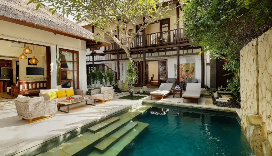 Villa Nayra, Jimbaran, Bali — luxury private pool outdoor lounge area | The Luxury Bali