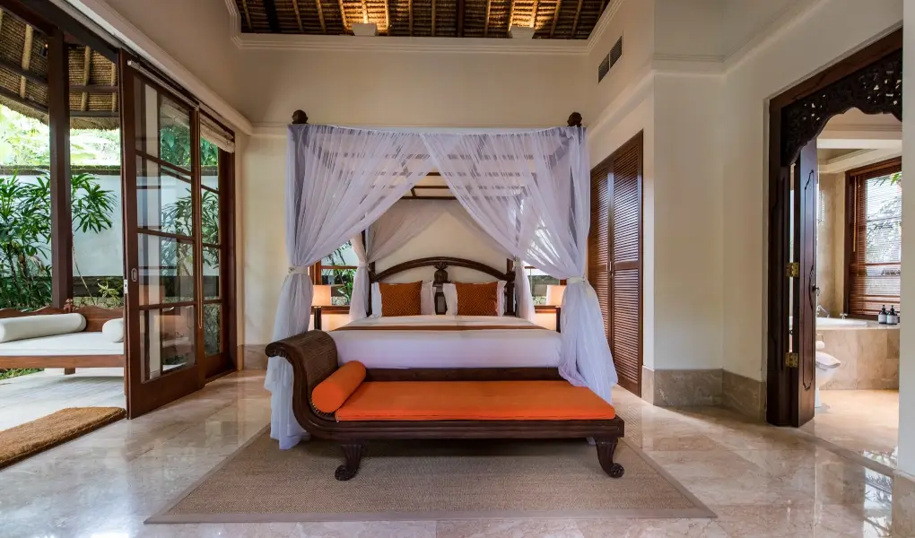 Villa Senada, Jimbaran, Bali — elegant balinese pavilion room with canopy bed and garden view | The Luxury Bali