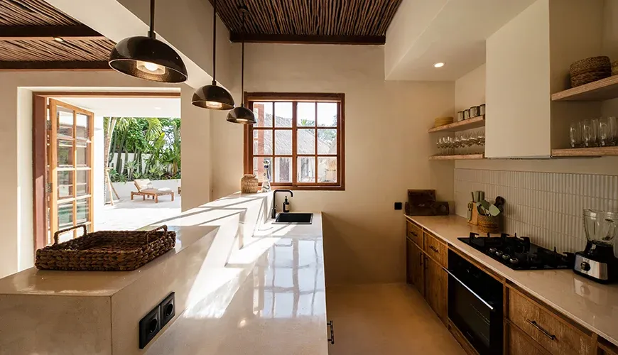Villa Xanadu, Canggu, Bali — modern kitchen with a sleek island and bar seating | The Luxury Bali