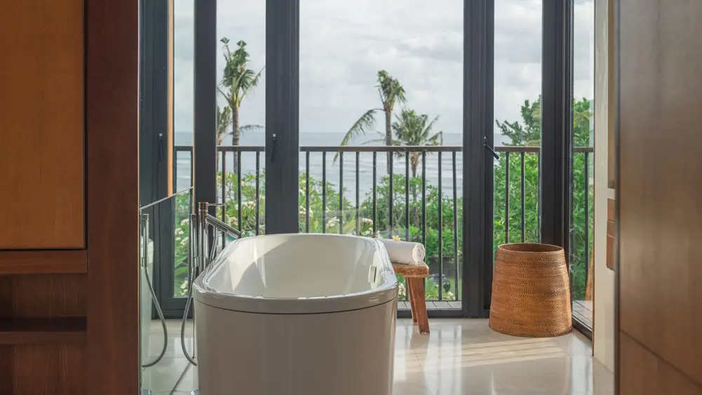 Arnalaya Beach House, Canggu, Bali — ocean suite bathroom overlooking | The Luxury Bali