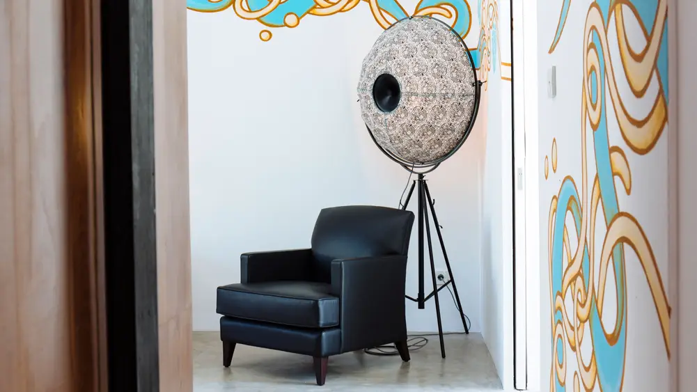 Villa Canggu North, Canggu, Bali — bedroom one corner chair and art | The Luxury Bali