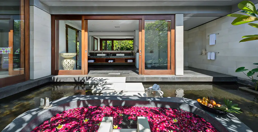 Bendega Villas, Canggu, Bali — rato master bedroom flower bath | The Luxury Bali