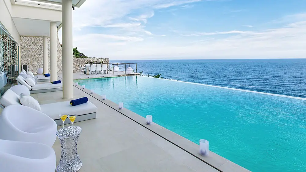 Grand Cliff Ungasan, Uluwatu, Bali — front residence relaxing pool side | The Luxury Bali
