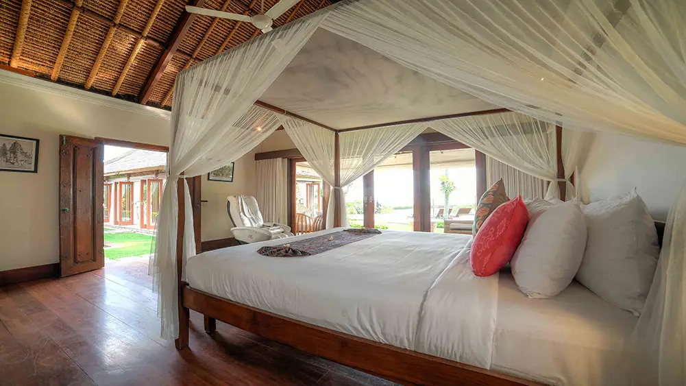 Villa Tanju, Seseh, Bali — cosy guest bedroom layout | The Luxury Bali