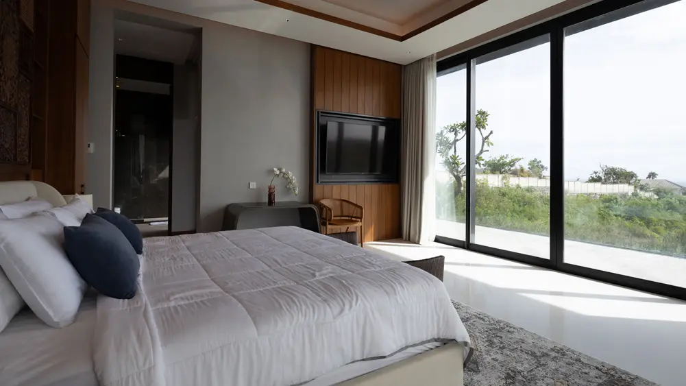 Villa Bie, Uluwatu, Bali — restful bedroom with stunning views | The Luxury Bali
