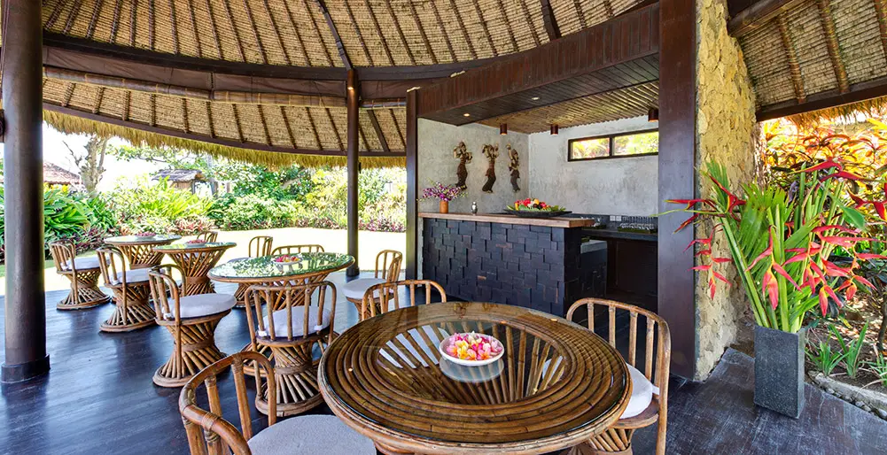 Taman Ahimsa, Seseh, Bali — poolside cabana dining area | The Luxury Bali
