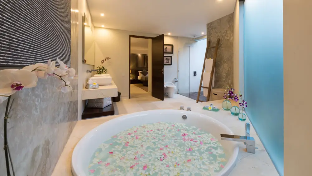 The Layar, Seminyak, Bali — bedroom flower petal bath | The Luxury Bali