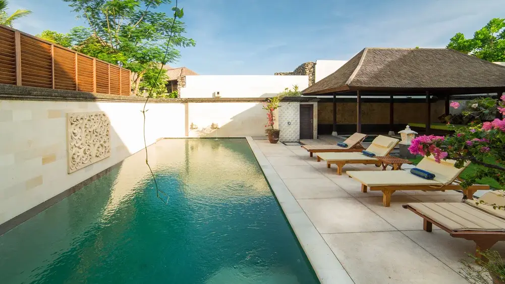Bayu Gita Residence, Ketewel, Bali — sun loungers by the pool | The Luxury Bali
