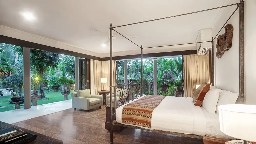 Avalon I, Canggu, Bali — main house downstairs master bedroom with garden view | The Luxury Bali