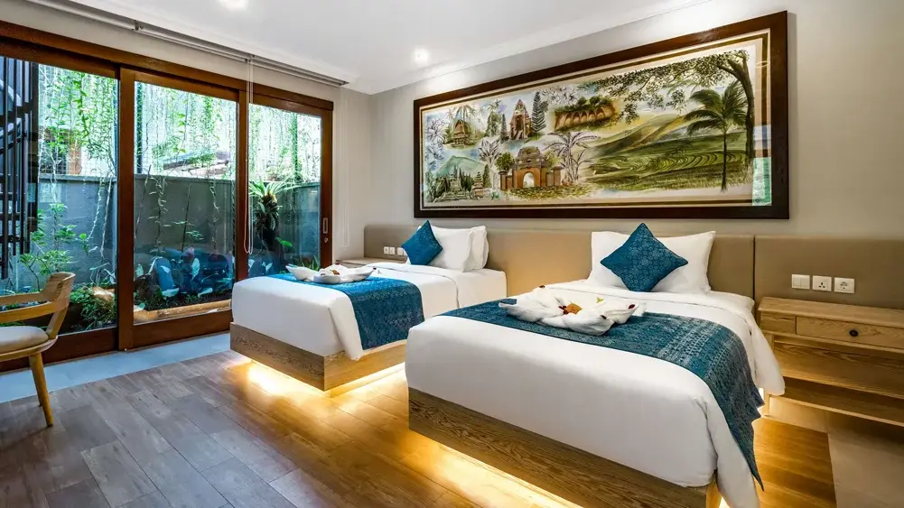 The Pala Ubud - Villa Batur, Ubud, Bali — luxurious guest bedroom by a pocket garden | The Luxury Bali