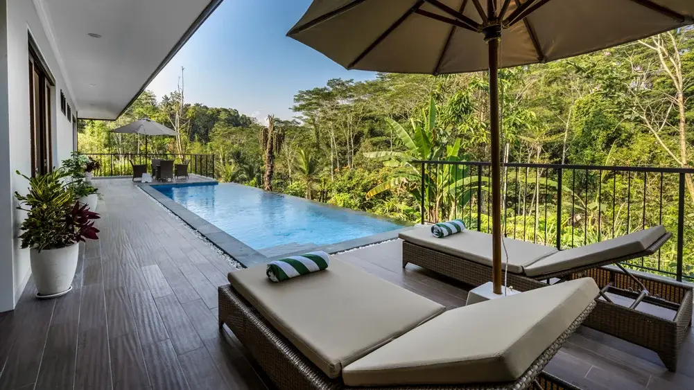 The Pala Ubud - Villa Seraya A, Ubud, Bali — relax under shady weather by the cantilever pool | The Luxury Bali