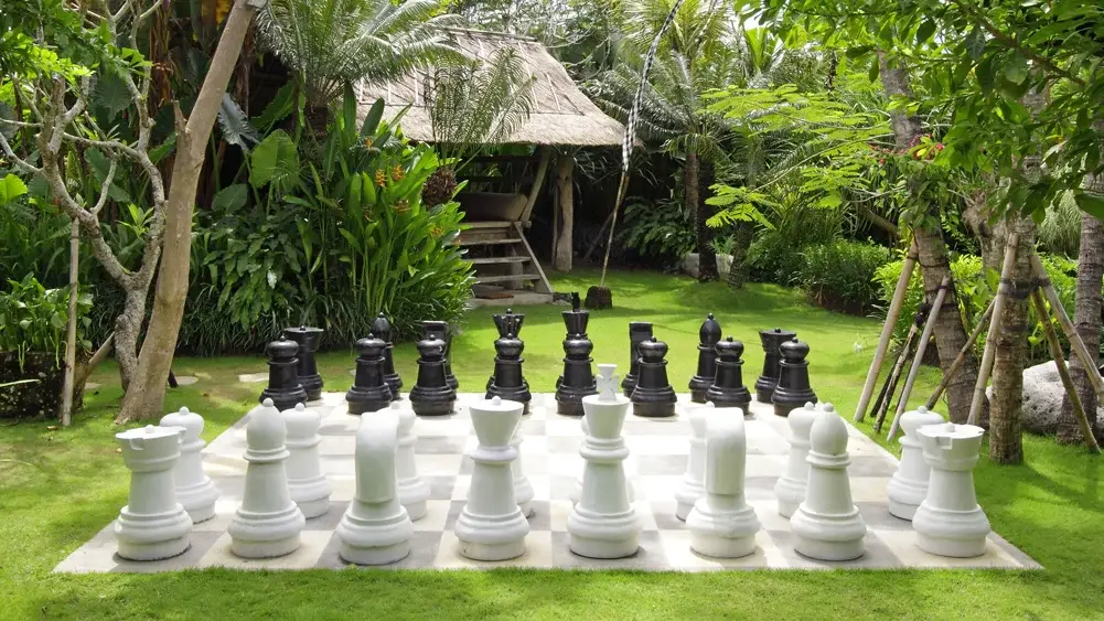 Dea Villas - Villa Sarasvati, Canggu, Bali — giant garden chess | The Luxury Bali