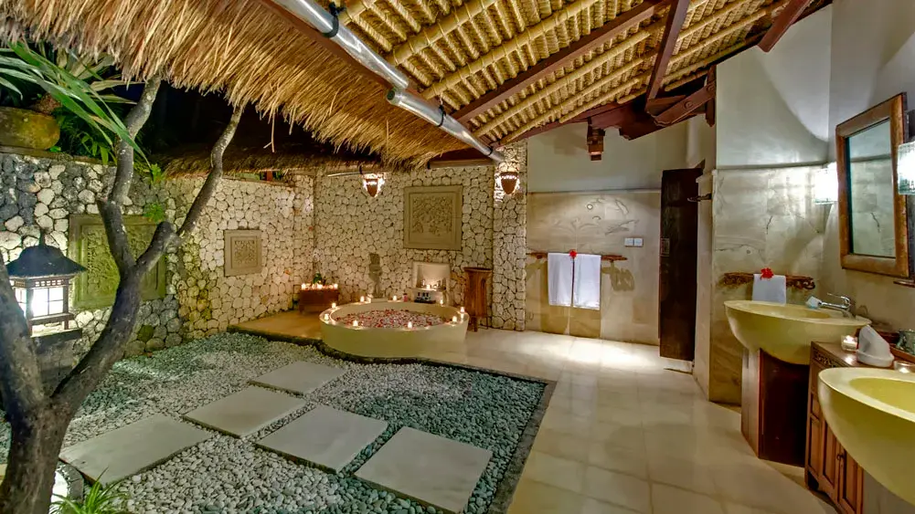 Sungai Tinggi Beach Villa, Canggu, Bali — master bathroom at night | The Luxury Bali