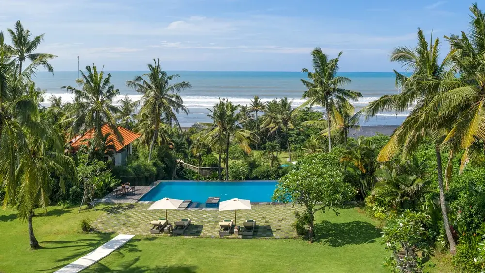 Villa Kailasha, Tabanan, Bali — expansive lawn and pool | The Luxury Bali