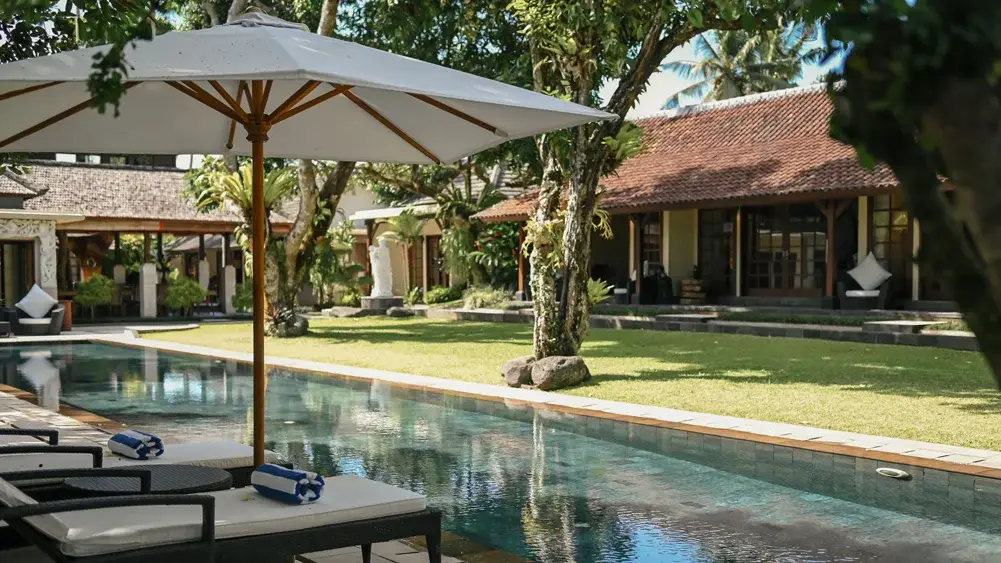 Villa San, Ubud, Bali — relaxing pool by the lawn | The Luxury Bali
